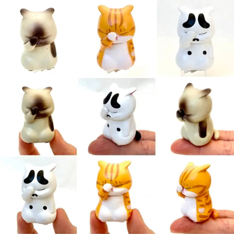 cat face palm Face Palm Cat Figurine